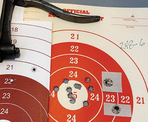 Examples of bullets cutting round holes and tipping bullets. The shots on the left-hand target are nice, round holes with no indication of tipping. The shot at one o’clock in the 25-ring on the right-hand target appears to be tipping; this is a double, which can resemble a tipped bullet. The two shots on the far right show clear evidence of tipping. Notice the mark from the base at 3 and 7 o’clock.
